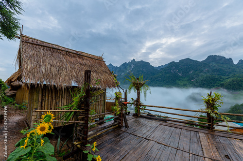 Hut and Doi Luang Mountain in Chiang Dao photo