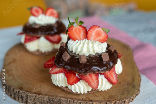 Chocolate pavlova with fresh strawberries and whipped cream
