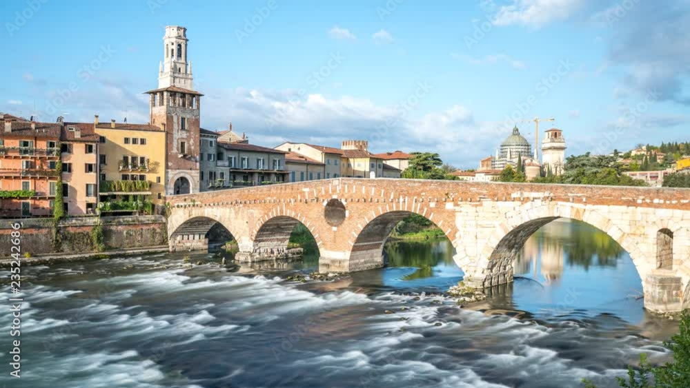 Ponte Pietra Bridge in Verona City Italy at day and river timelapse in 4K. Ponte Pietra Bridge in Verona City Italy at day and river timelapse in 4K.