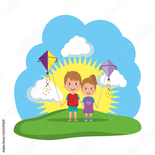 kids couple with kite flying in the field