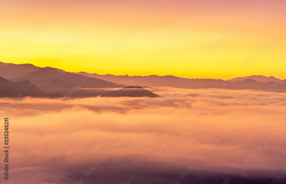  Landscape view of sunrise with white fog  in early morning on the top of the hill at yun lai viewpoint, pai, Mae Hong Son, thailand
