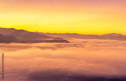 Landscape view of sunrise with white fog in early morning on the top of the hill at yun lai viewpoint, pai, Mae Hong Son, thailand