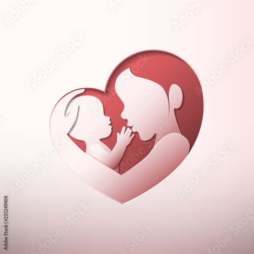 Mother holding a baby in heart shaped silhouette paper art