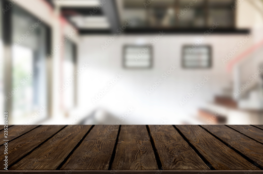 Wooden board empty Table Top And Blur Interior over blur in coffee shop Background, Mock up for display of product Wooden board empty Table Top And Blur Interior over blur in coffee shop Background, Mock up for display of product