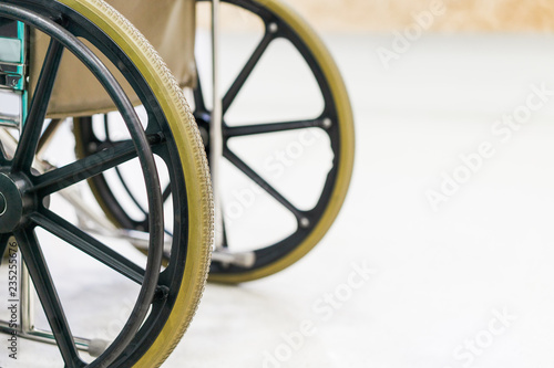 Wheelchair with patient waiting doctor in hospital