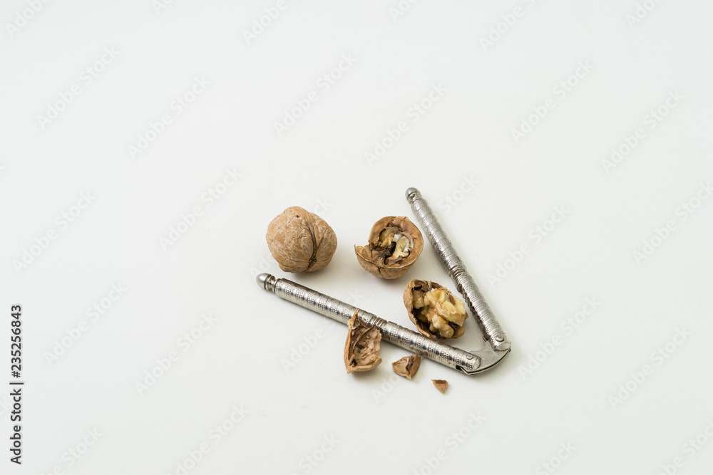 Walnuts and nut cracker tool