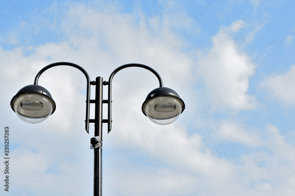 Close-up of street light against blue sky Close-up of street light against blue sky