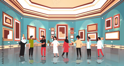 mix race people tourists in modern art gallery museum interior looking creative contemporary paintings artworks or exhibits visitors communication concept horizontal