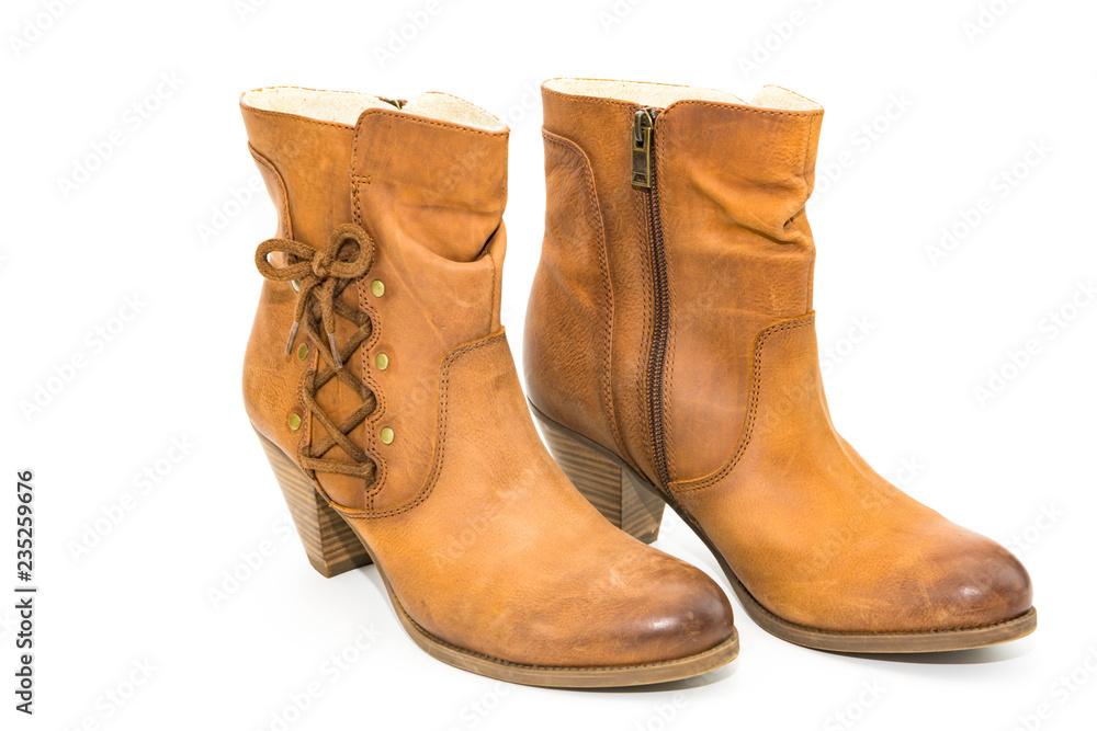 Women's autumn shoes made of genuine brown leather with laces on an isolated background. Spring shoes with heels Women's autumn shoes made of genuine brown leather with laces on an isolated background. Spring shoes with heels