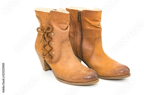 Women's autumn shoes made of genuine brown leather with laces on an isolated background. Spring shoes with heels 