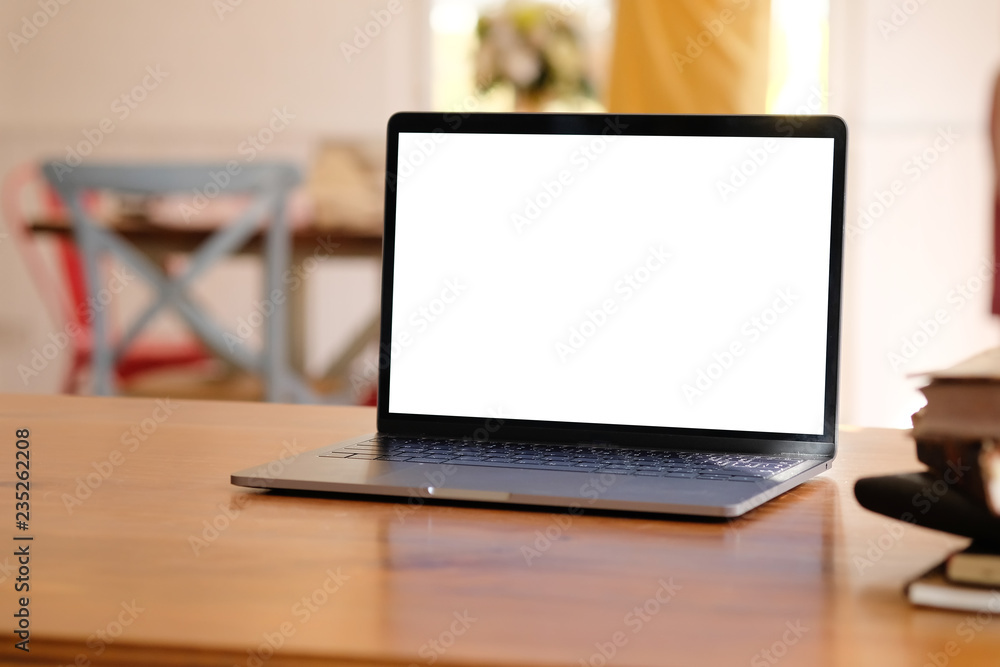 Mockup laptop computer on wood table. Mockup laptop computer on wood table.