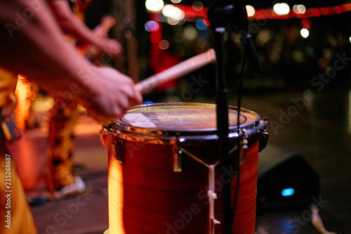 Wallpaper Mural Drummer hands playing drum set at concert on stage. Music show. Bright scene lighting in club,drum sticks in hands Torontodigital.ca