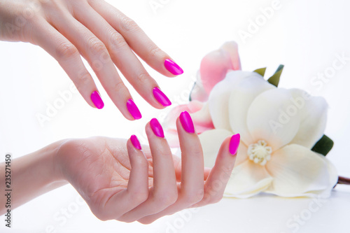 a woman s nail  designed with nail art