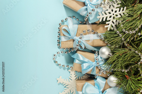 Wallpaper Mural Gift boxes wrapped in craft paper with blue satin ribbons Torontodigital.ca