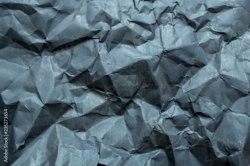 Background of crumpled black paper. 
