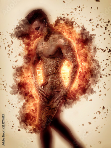 Muscular naked man covered in gold, with fire explosion behind him, looking down sensually on light background