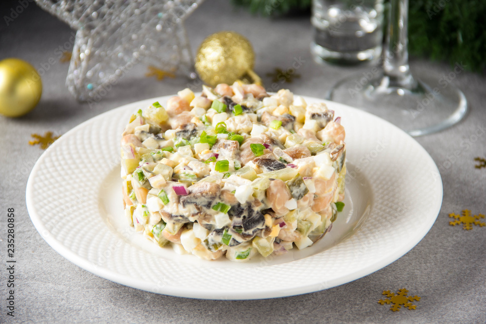 Russian salad with meat, potatoes, egg, cucumber, onion, mushrooms and mayonnaise. Olivier for new year table, Christmas snack Russian salad with meat, potatoes, egg, cucumber, onion, mushrooms and mayonnaise. Olivier for new year table, Christmas snack