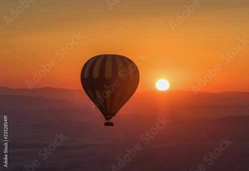 Goreme, Turkey - A Unesco World Heritage site, Goreme and Cappadocia are famous also for the spectacular ballooning excursions. Here in particular a sunrise ballooning