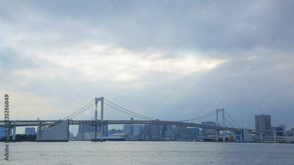 View of Tokyo Bay and Rainbow Bridge. Odaiba District, Tokyo, Japan. Time Lapse. View of Tokyo Bay and Rainbow Bridge. Odaiba District, Tokyo, Japan. Time Lapse.