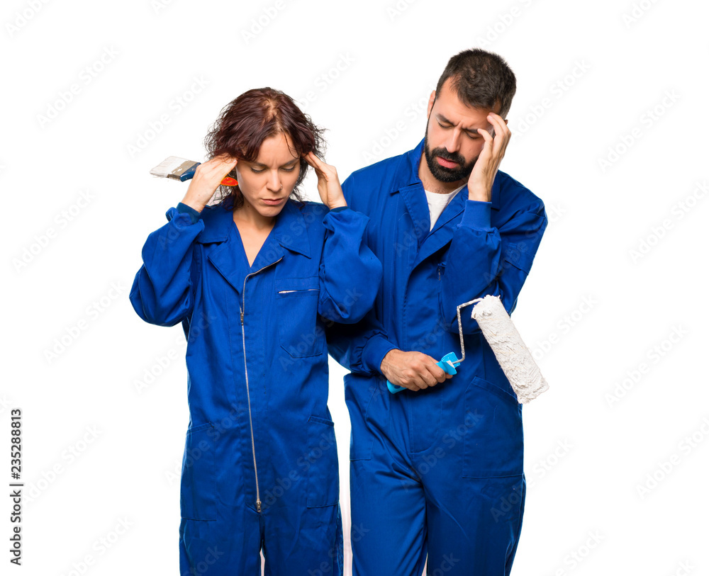 Painters unhappy with something. Negative facial expression on isolated white background Painters unhappy with something. Negative facial expression on isolated white background