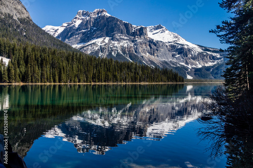 Emerald green waters of Emerald Lake with Mount burgess in the background, Yoho National Park, British Columbia, Canada