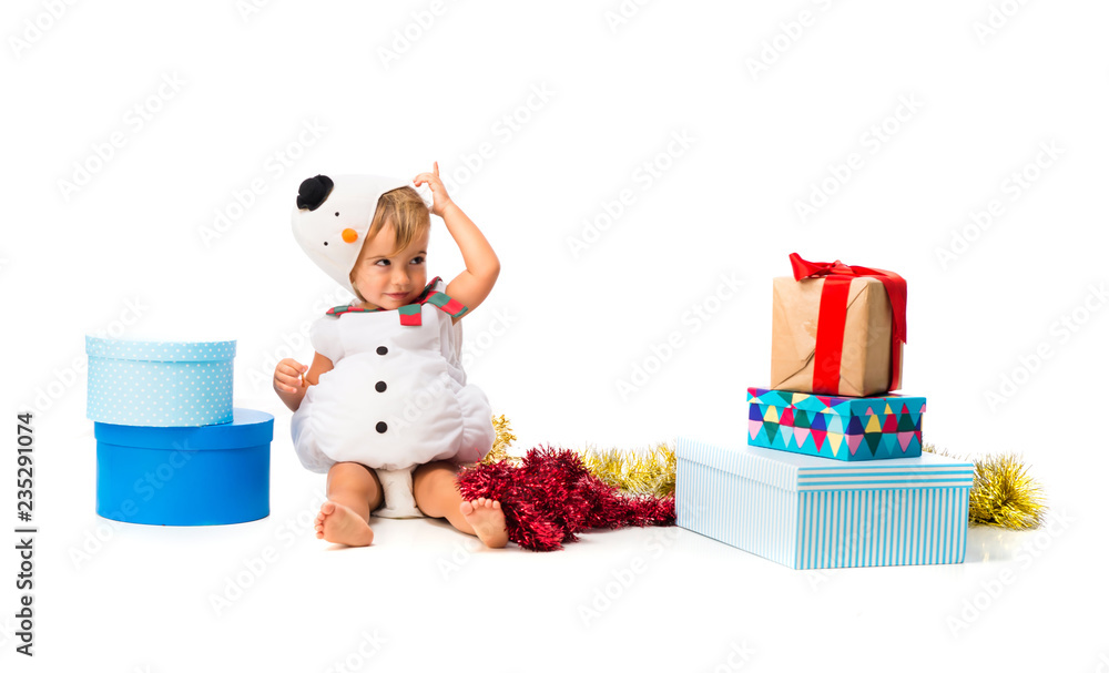 Naklejka premium Adorable little baby dressed like a snowman at Christmas parties on isolated white background