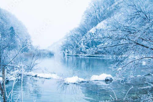 Croatia, Plitivice, winter landscape, frozen waterfalls and lakes in popular nature park Plitvicka jezera photo