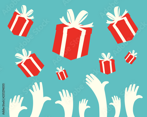 Hands reaching for the gift box