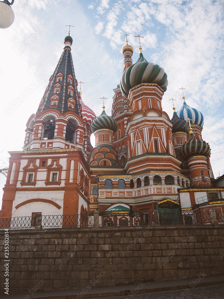 Fototapeta premium Moscow, Russia - october 1, 2018: Autumn decorations on Manezhnaya square near the Moscow Kremlin during festival Golden Autumn. Cart with pumpkins and hay, harvest holiday Moscow seasons