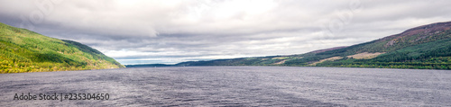 A spectacular view of Scottish outdoors with Loch Ness lake and its shores