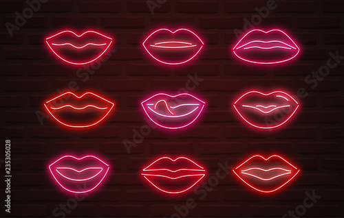 Vector neon lips signs over brickwall background