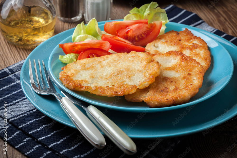 Crispy fried homemade potato pancakes. Crispy fried homemade potato pancakes.
