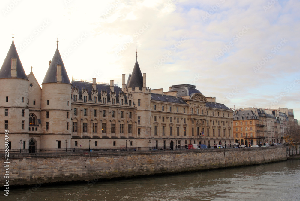 Cityscape of Paris with a view on Conciergerie building.