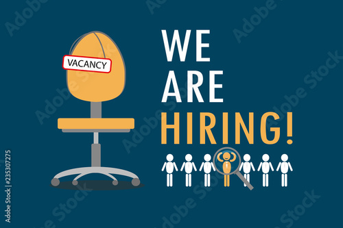Office chair with sign vacancy.Tagline We Are Hiring