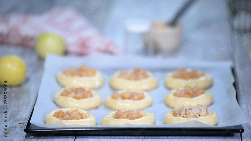 Making homemade open patties with apple. Vatrushka, apple patty - traditional Russian baking. Making homemade open patties with apple. Vatrushka, apple patty - traditional Russian baking.