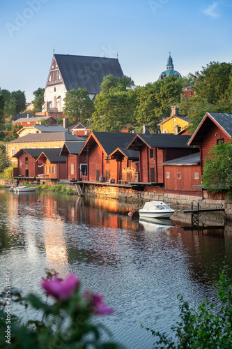 Beautiful city landscape with idyllic river and old buildings at summer evening in Porvoo, Finland