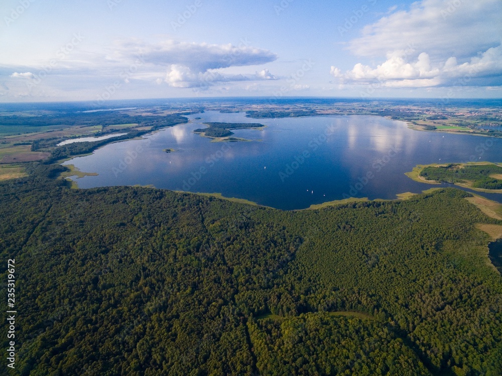 Obraz premium Aerial view of Upalty island on Mamry Lake, Mazury, Poland. Upalty is the biggest Masurian island