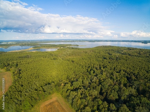 Aerial view of rural landscape of lake district - Mazury, Poland. Kirsajty and Dargin Lakes in the background photo