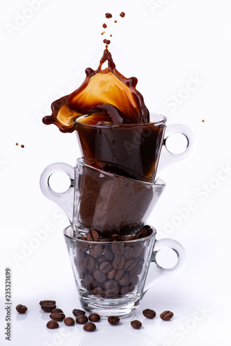 in glass cups, animated sequence vertically with coffee beans, ground coffee, and drink with sketch. still life photo