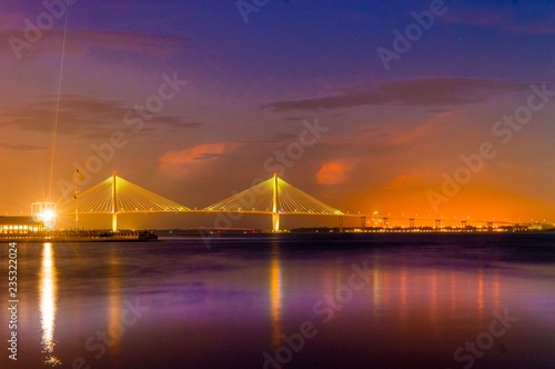 Fototapeta Naklejka Na Ścianę i Meble -  Charleston Harbor bridge illuminated at sunset