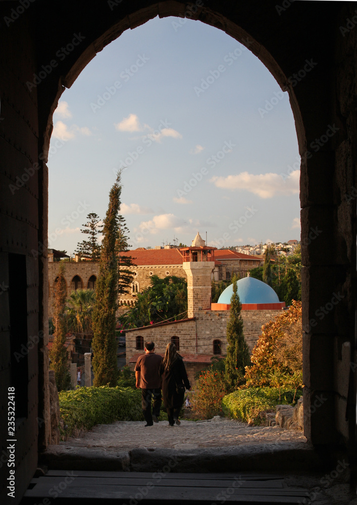 Couple leaving Byblos castle in Lebanon