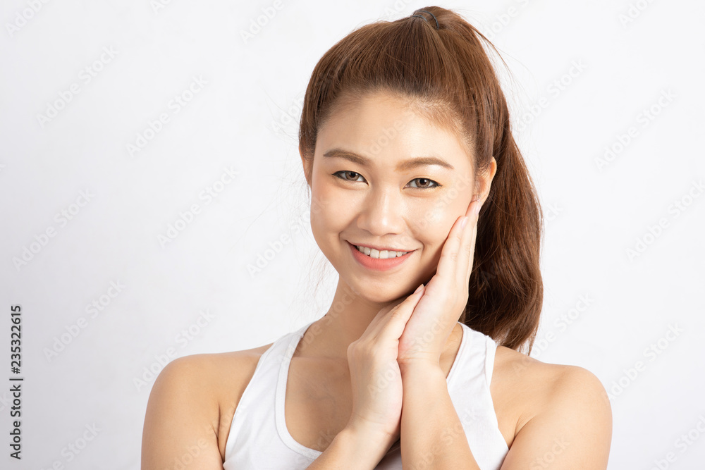 Beautiful Attractive Charming Asian young woman smile with white teeth and touching soft cheek feeling so happiness and cheerful with healthy skin,isolated on white background,Beauty Concept Beautiful Attractive Charming Asian young woman smile with white teeth and touching soft cheek feeling so happiness and cheerful with healthy skin,isolated on white background,Beauty Concept
