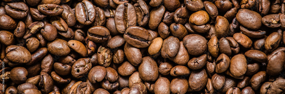 coffee grain (good and bad grain) - Arabica and Robusta blend (roasted coffee grain). Black background. Top view . Copy space. coffee grain (good and bad grain) - Arabica and Robusta blend (roasted coffee grain). Black background. Top view . Copy space.
