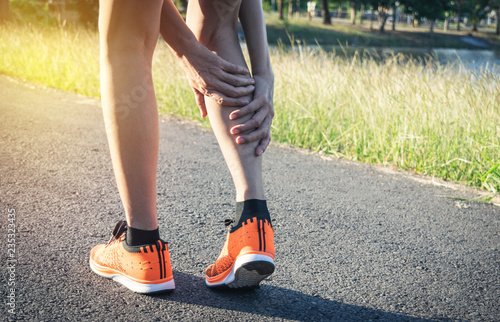 Woman walking on the road get accident for her legs the image is for health concept.