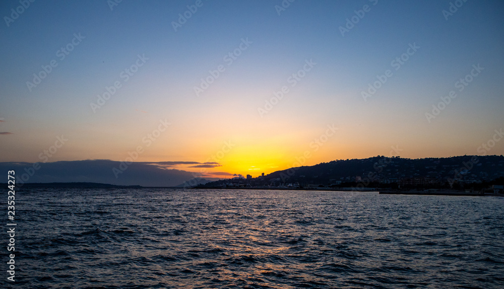 French Riviera beach at sunset in winter