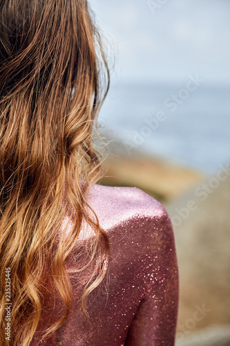  Woman's Back Covered By Golden Glitter