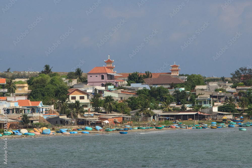 mui ne coast view of the village with fisher boats, vietnam