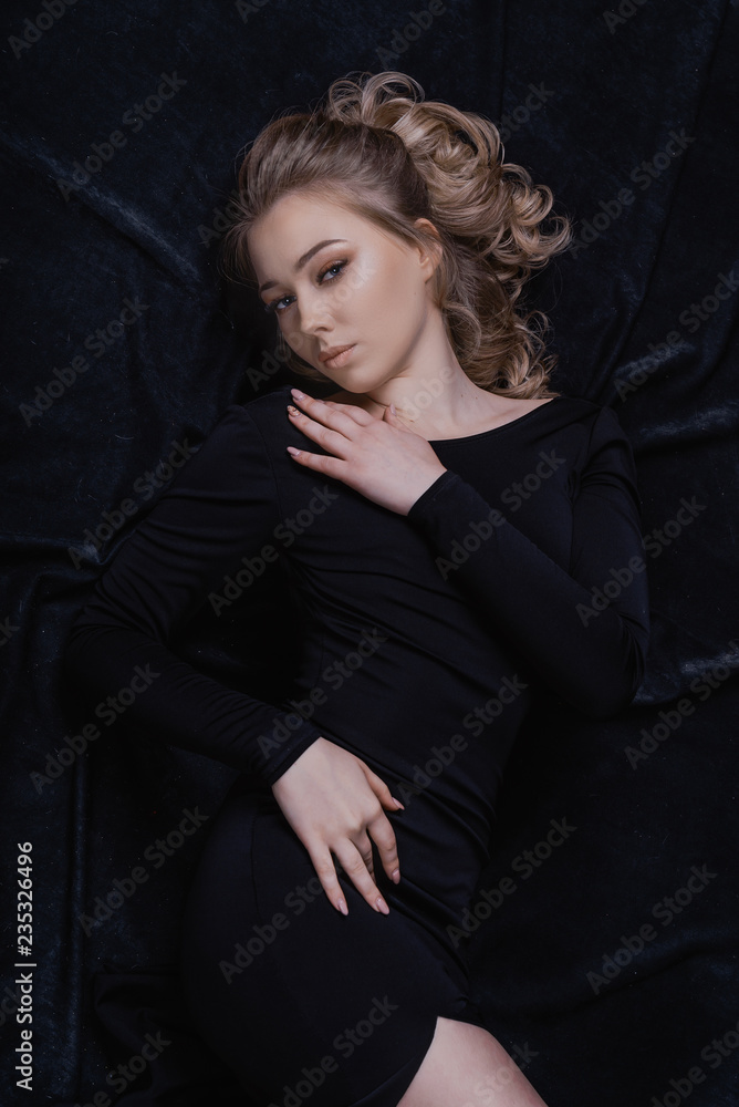 Naklejka premium Portrait of a beautiful young woman. Studio shot.