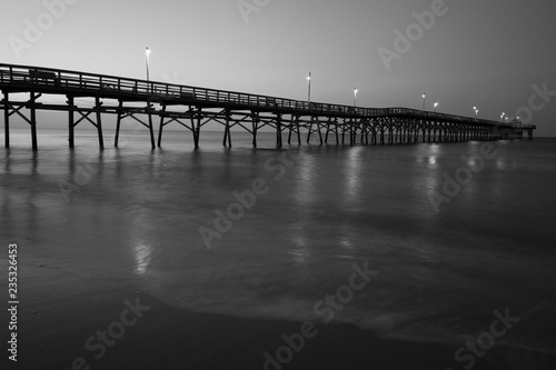 Black and White pier at sunrise