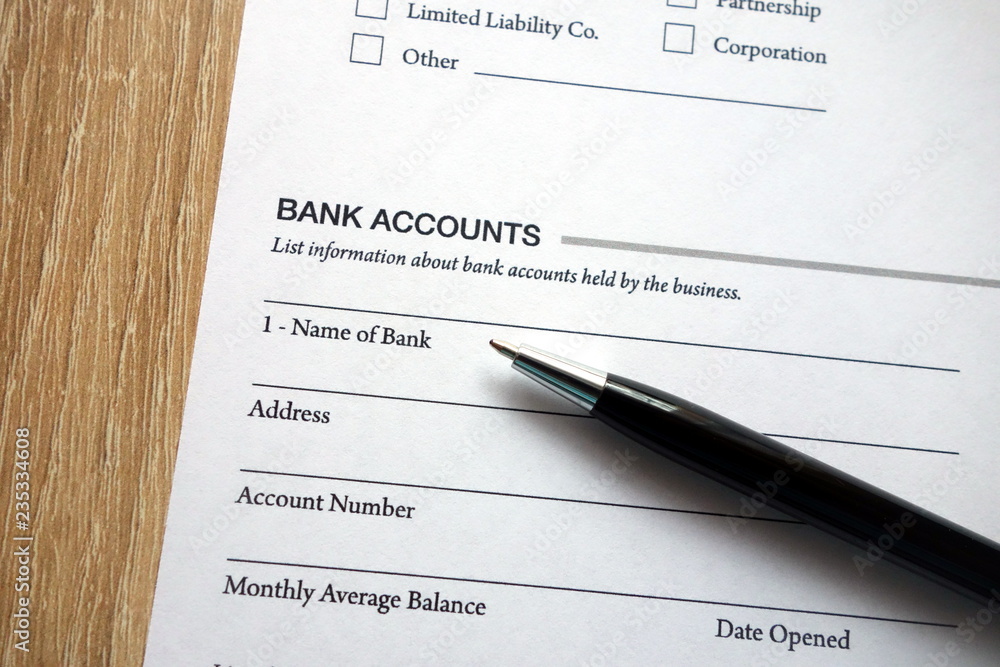 Bank accounts heading on document and pen Bank accounts heading on document and pen